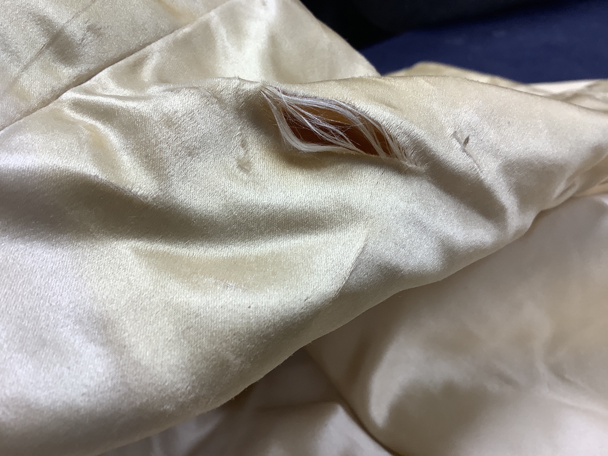 A Firth and Russell cream satin and lace wedding dress